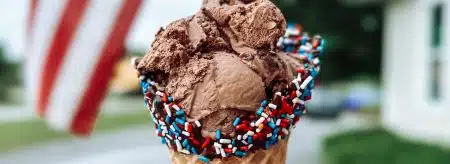 A hand holding an ice cream cone in Charlottesville, VA